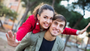 Couple hugging in park